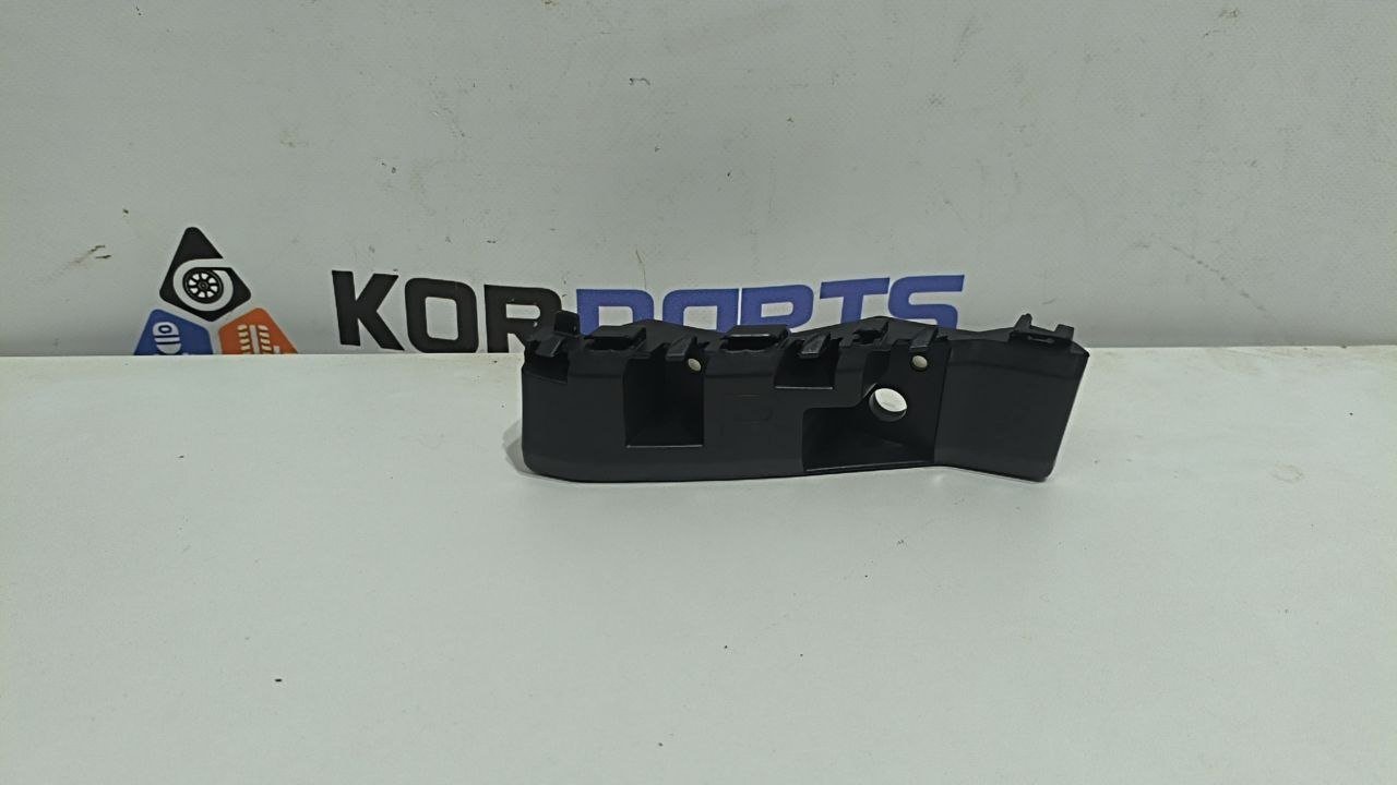 9kGSpsgLvTfS55oLA2NjbnAad6JyyPCr Кронштейн переднього бампера правий Hyundai Santa Fe MX5 Front bumper side bracket RH 86552P6000 - Зображення 1