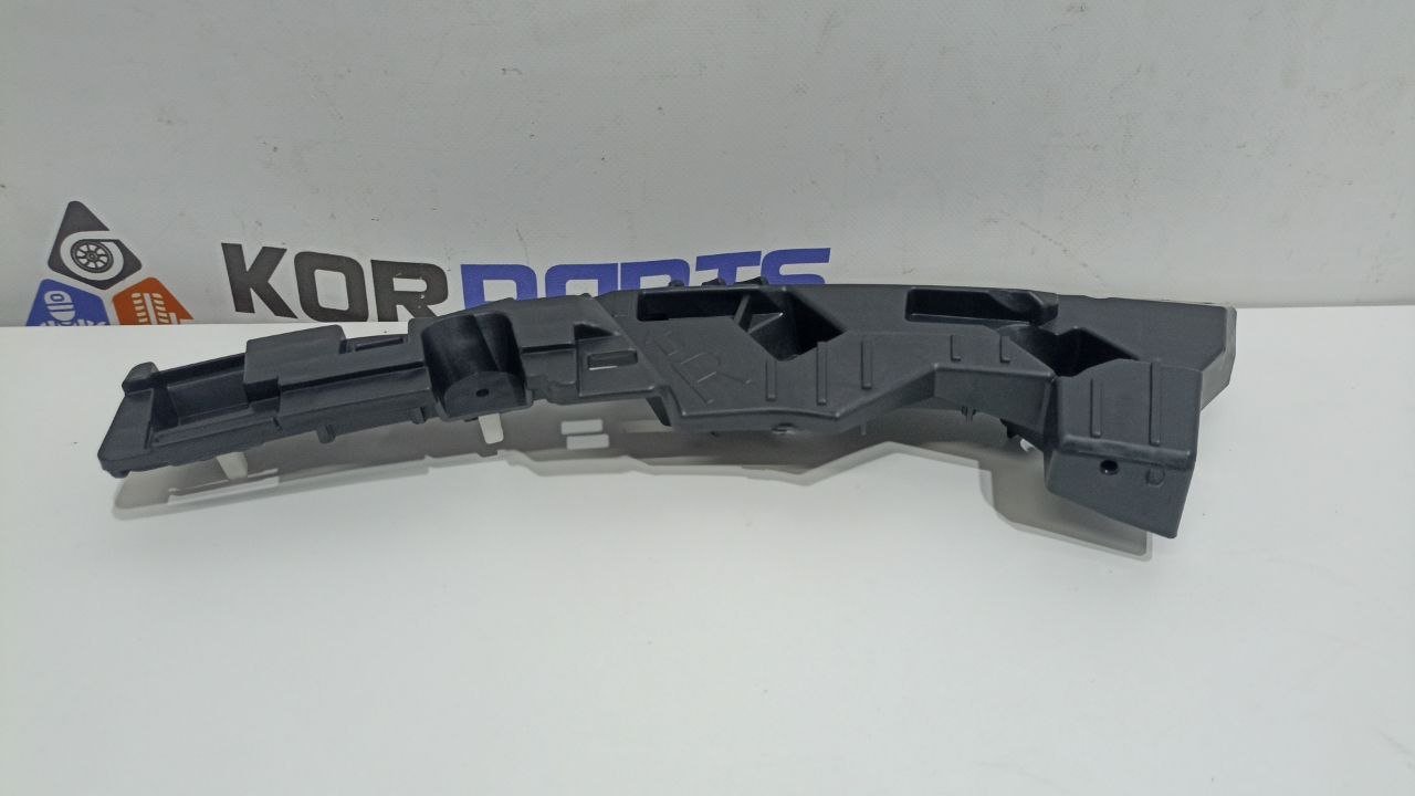 TQ5RaW62qvaLhqDk0mC7wSjh3vWWvCNQ Кронштейн бічний переднього бампера, правий Hyundai IONIQ 5 Front Bumper Side Bracket Right 86552GI000 - Зображення 1