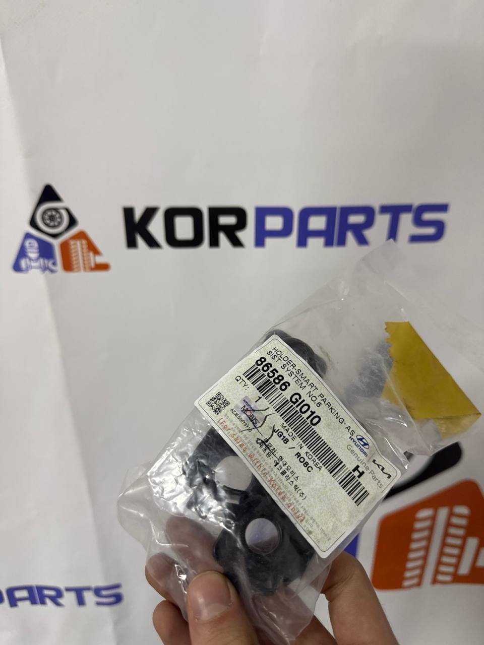 agacagiaaxkbaaidxglh Hyundai IONIQ 5 (2021–2024) Тримач датчика паркування №6 86586GI010 - Зображення 1