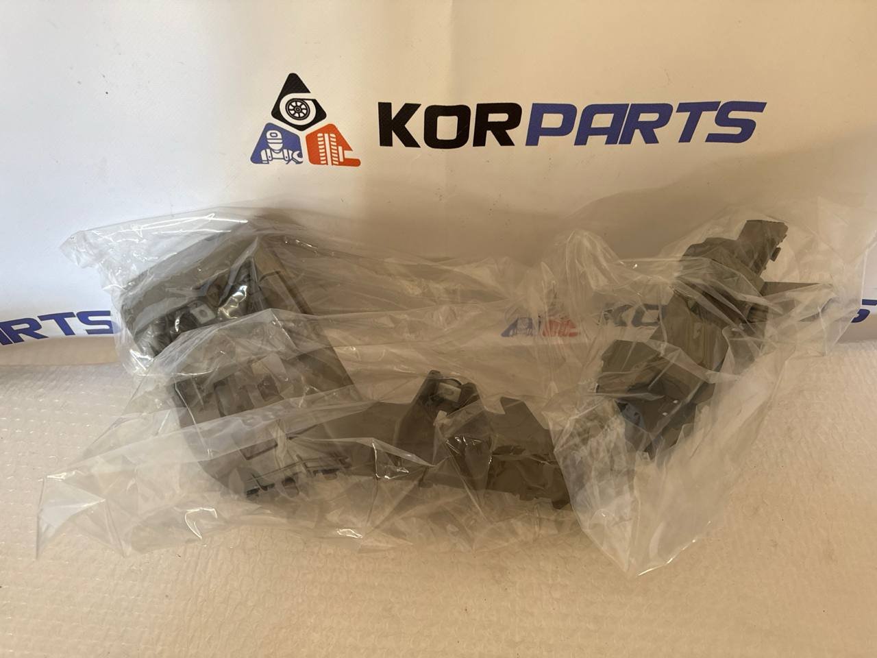 agacagiaaxkbaaihpglk KIA EV6 BRACKET-RR BUMPER SIDE MTG,LH Кронштейн бічний кріплення заднього бампера, лівий 86653CV500 - Зображення 1