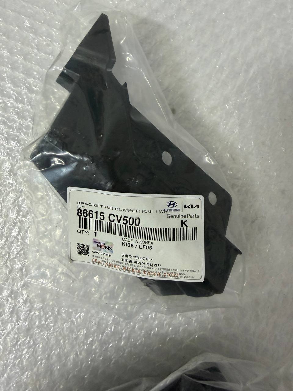 agacagiaaxkbaaijbmlm KIA EV6 BRACKET-RR BUMPER RAIL LWR,LH Направляюча кронштейна заднього бампера нижня, лівий 86615cv500 - Зображення 1