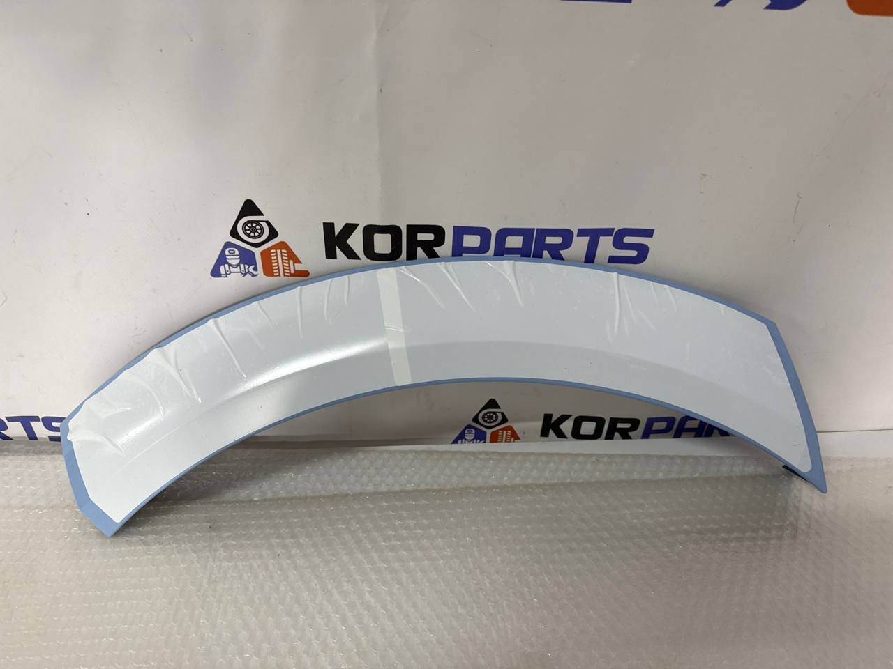 agacagiaaxkbaaiqr2ls Hyundai IONIQ 5 N GARNISH ASSY-QTR SIDE,RH Накладка заднього правого крила (чверті) 87742NI000SFB - Зображення 1