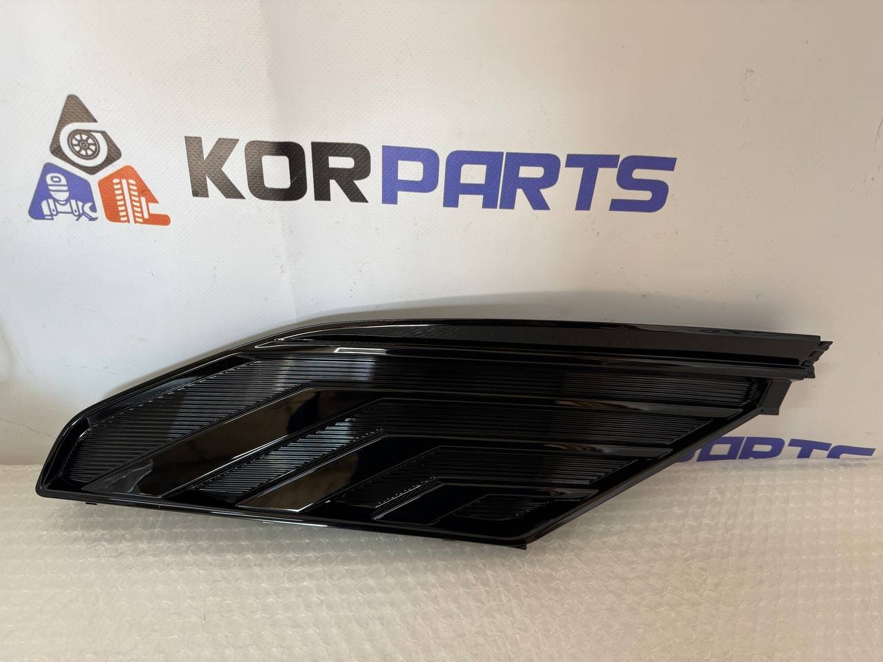 agacagiaaxkbaairuglu KIA EV6 MOULDING ASSY-FRONT BUMPER,RH Молдинг переднього бампера в зборі, правий 86596CVJB0AHV - Зображення 1