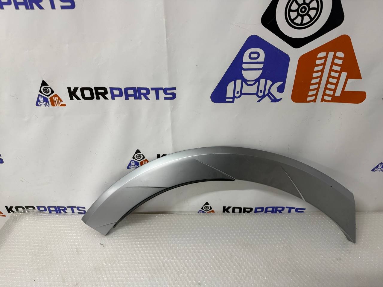 agacagiaaxkbaaitzmlx Hyundai IONIQ 5 GARNISH ASSY-QTR SIDE,RH Накладка заднього правого крила (чверті) 87742gi100yev - Зображення 1
