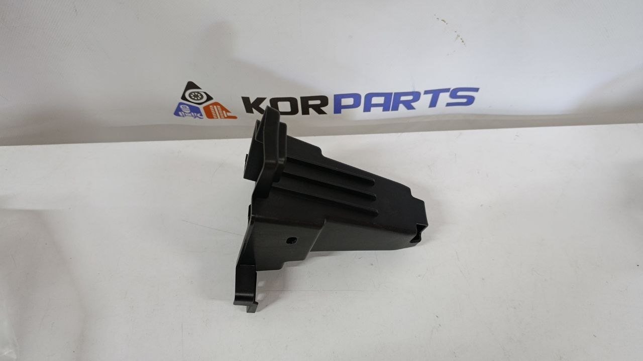 bkv8za9ystsnw0otsbnjoxmxze2hpgam Кронштейн решітки радіатора центральний Hyundai IONIQ 9 86355GO000 - Зображення 1