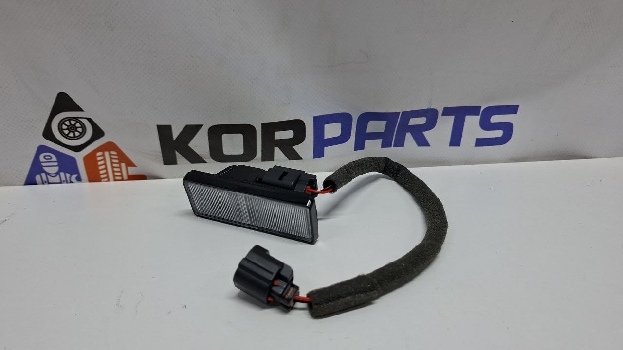 AVxzffckJP1PHgfPvGyiUn03PMXmiAJv Hyundai Santa Fe MX5 ліхтар освітлення номерного знака 92500P6000 - Зображення 1